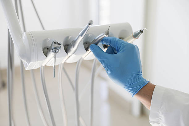 Professional Tooth Extraction technician working in Burleson, TX